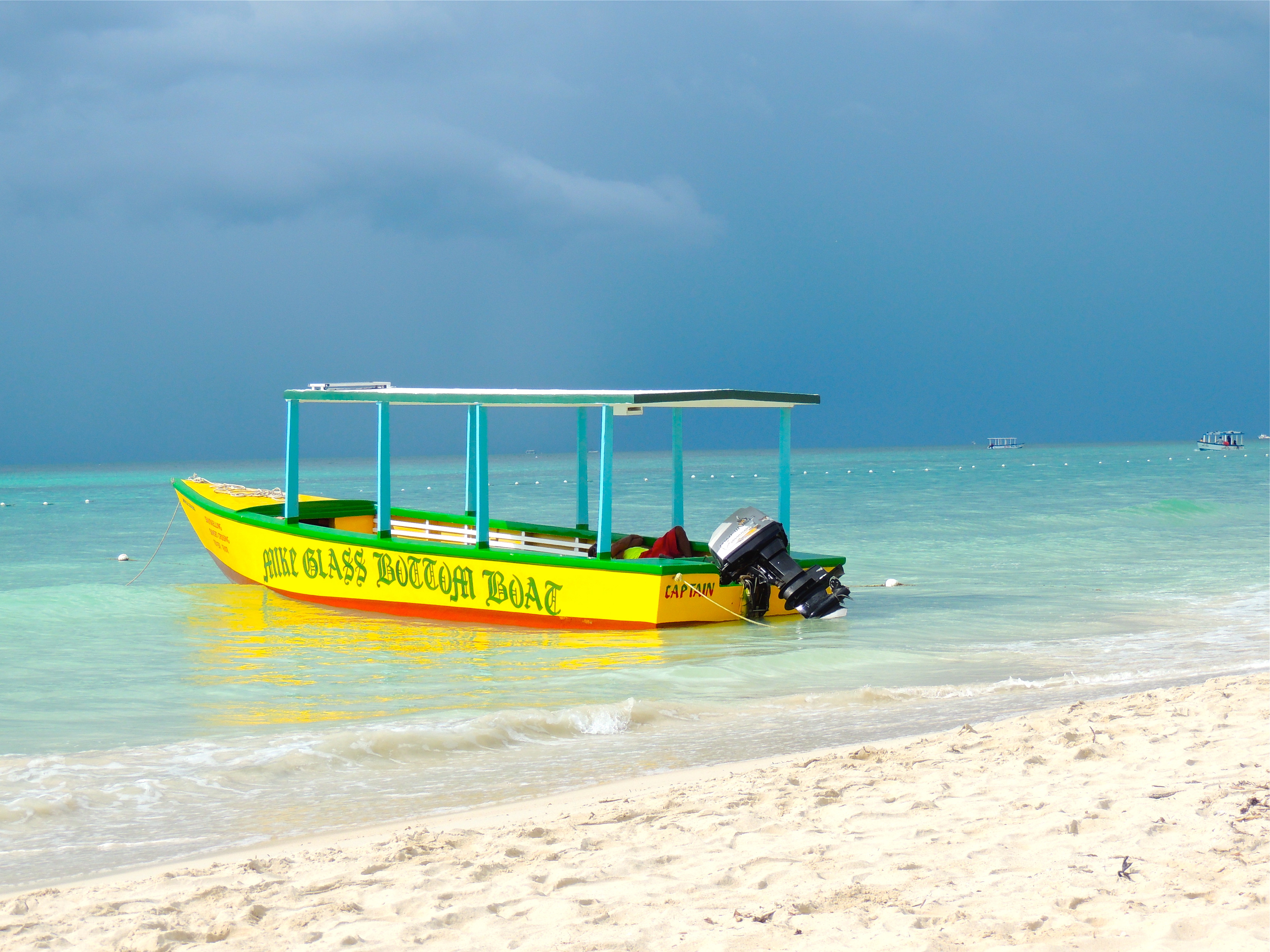 A lone glass bottom boat in Negril, Jamaica.