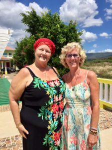 My friend, LaRhonda, and I enjoying a beautiful brunch at Tiano Cove, in Treasure Beach, Jamaica. This is a typical example of the enjoyable life offered in my 'likkle" town. 