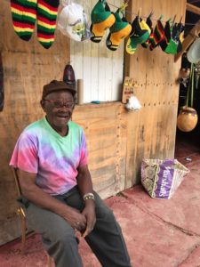 Finding common ground isn't that hard if you try. This is Angus selling his Jamaican souvenirs out of the little shop behind my house in Treasure Beach, Jamaica