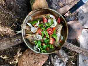 Is life in Jamaica affordable? A delicious healthy meal of fish and veggies, cooked over an open fire, Jamaican style.