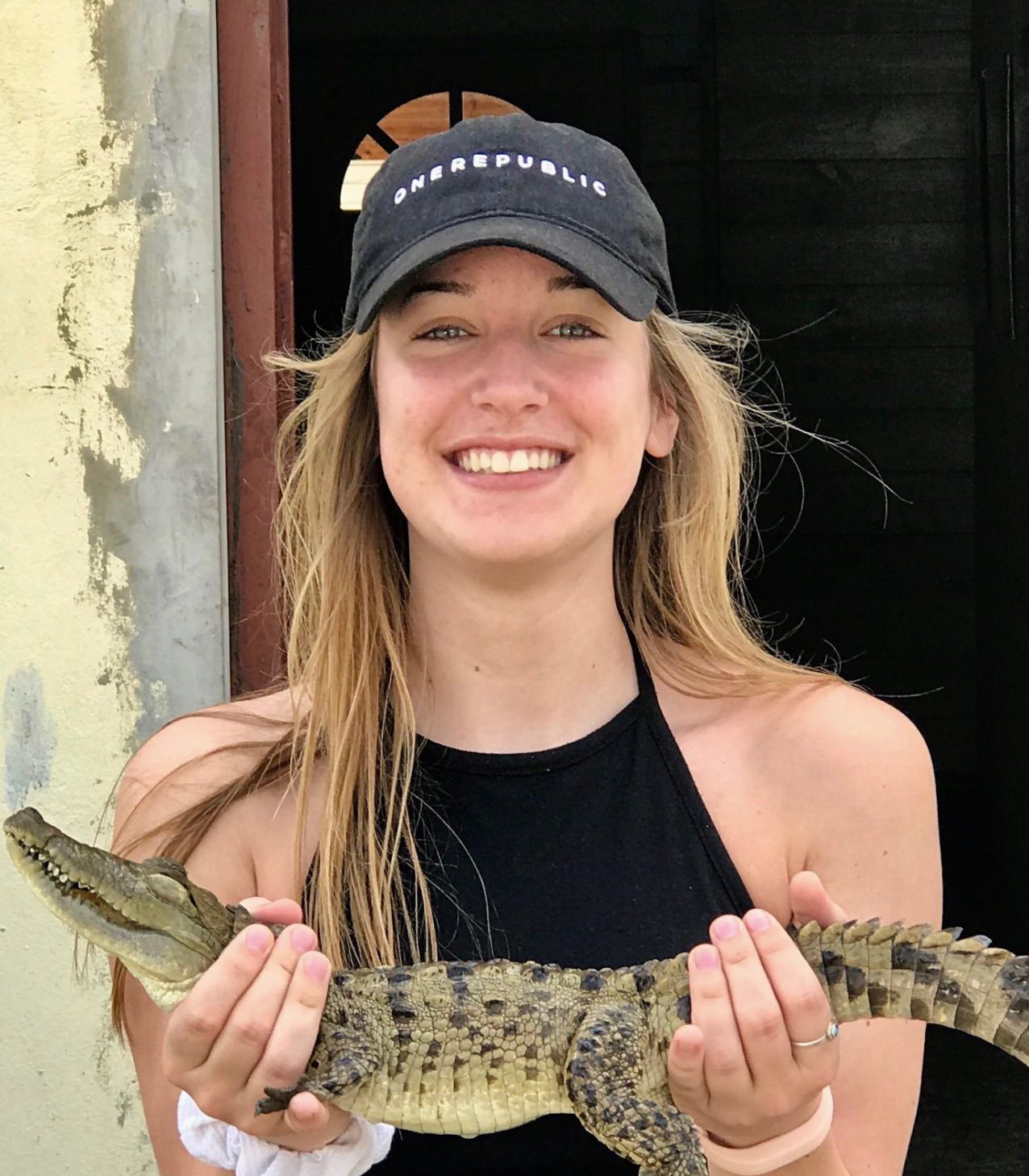 Holding a crocodile at Black River Safari, Jamaica