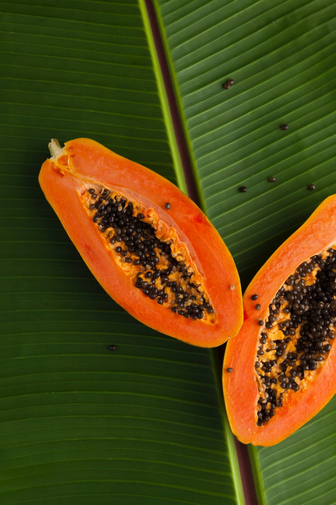 Interior of a ripe papaya with seeds.