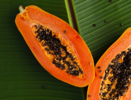 Interior of a ripe papaya with seeds.